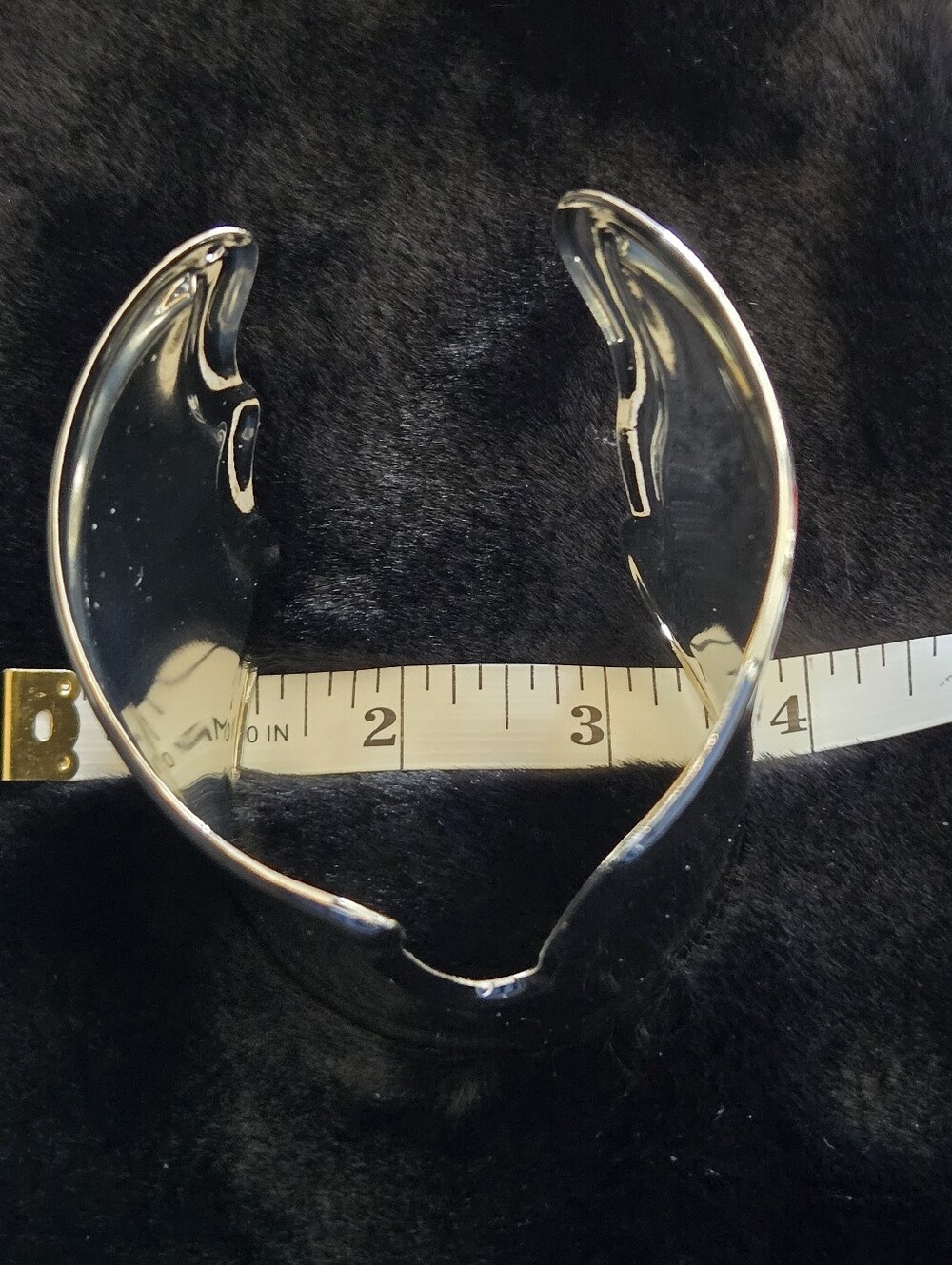 Polished Silvertone Cutout Adjustable Wide Arm Bracelet - Picture 5 of 6